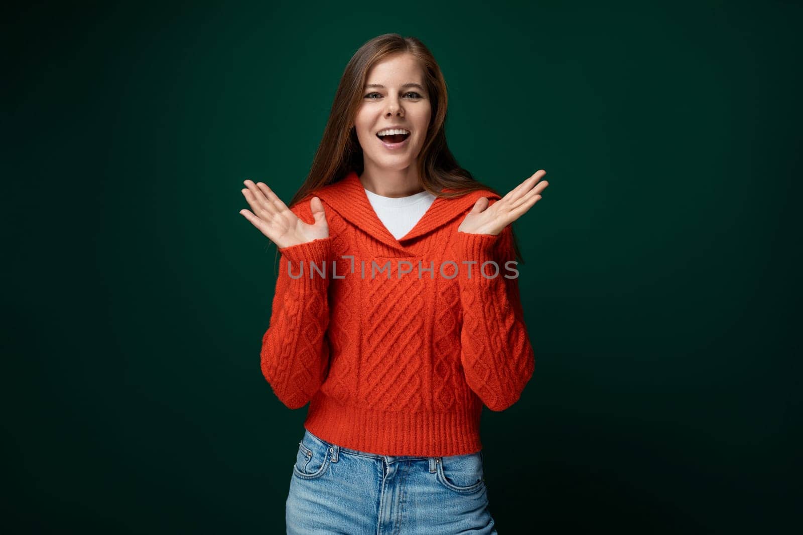 Cheerful 30 year old woman with brown hair smiles with enthusiasm by TRMK
