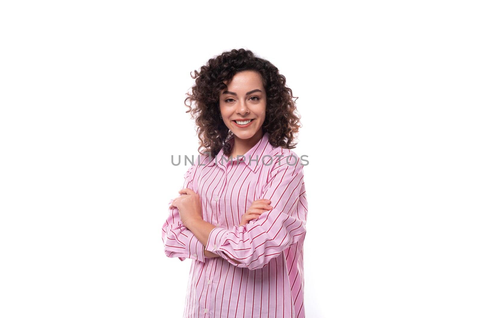 confident young office secretary woman dressed in a striped pink shirt on a white background by TRMK