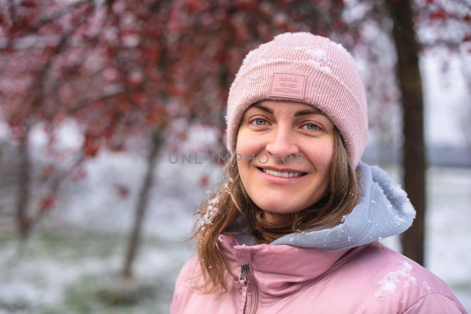 Winter Elegance: Portrait of a Beautiful Girl in a Snowy European Village