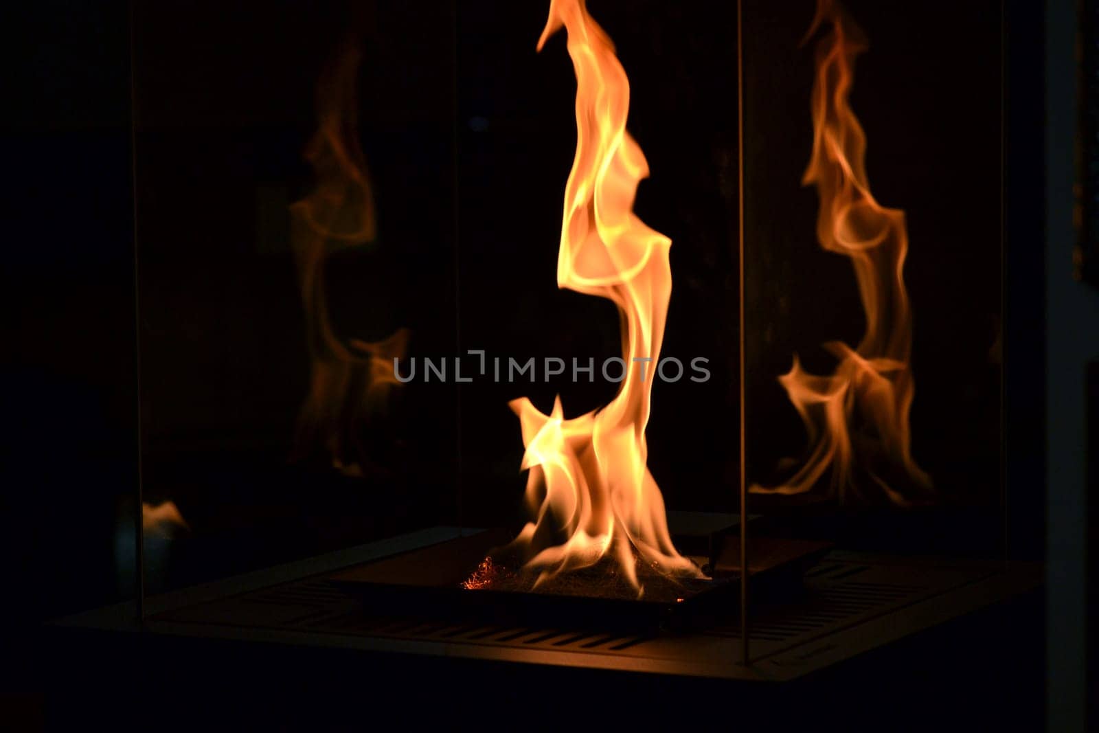 Modern bio fireplot fireplace on ethanol gas. Smart ecological alternative technologies. Contemporary biofuel on ethanol close-up. Energy saving innovation. Interior inside a house
