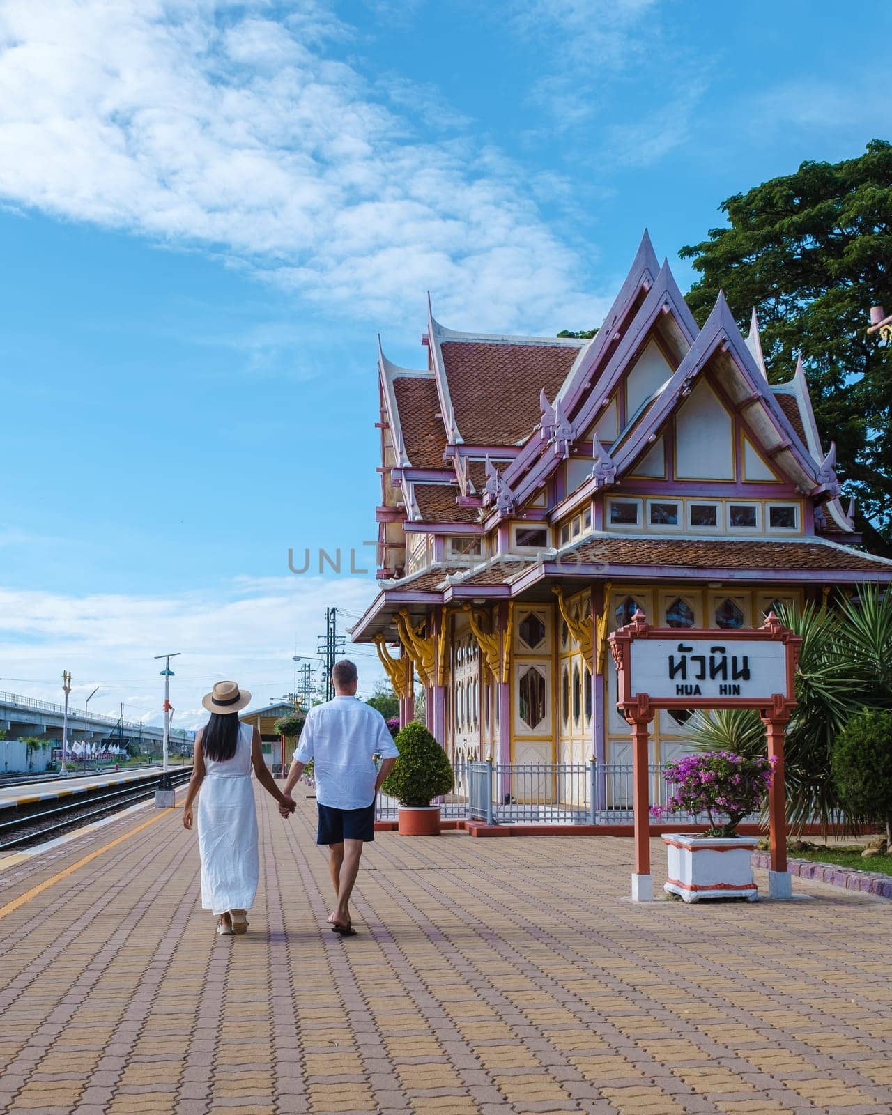 Hua Hin train station in Thailand. passengers waiting for the train in Huahin by fokkebok