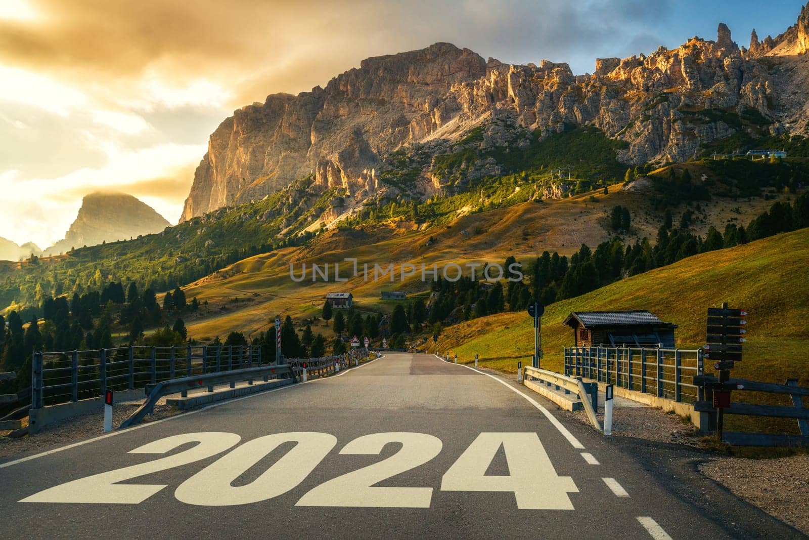 2024 New Year road trip travel and future vision concept . Nature landscape with highway road leading forward to happy new year celebration in the beginning of 2024 for bliss and successful start .