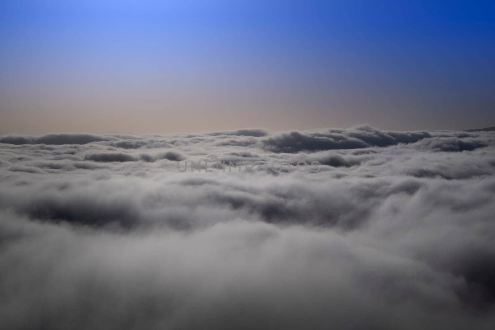 The fog rising in the valley early in the morning  by fotografiche.eu