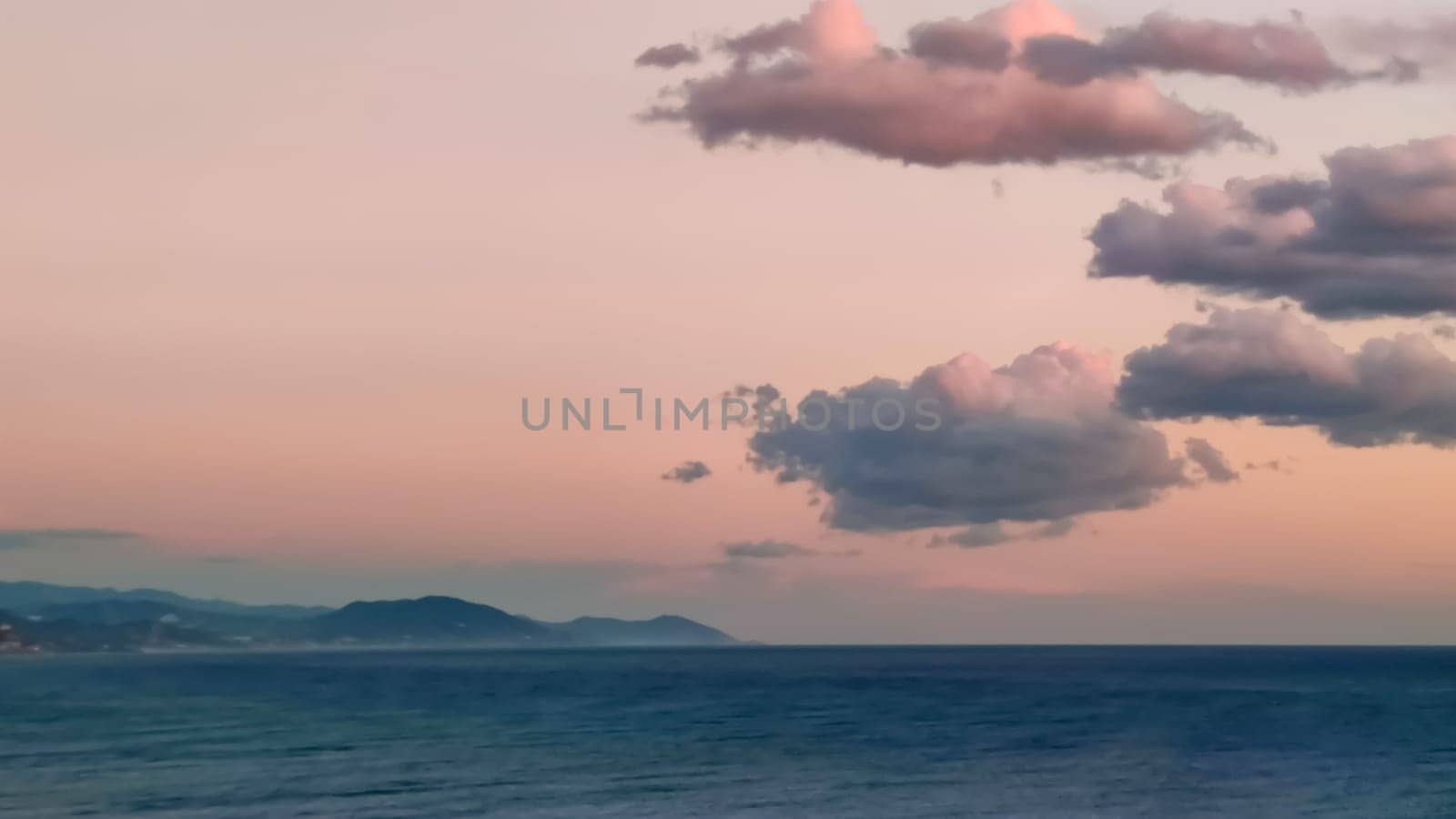 Background of pink clouds in evening sky over sea, twilight fairy sunset, copy space by Laguna781