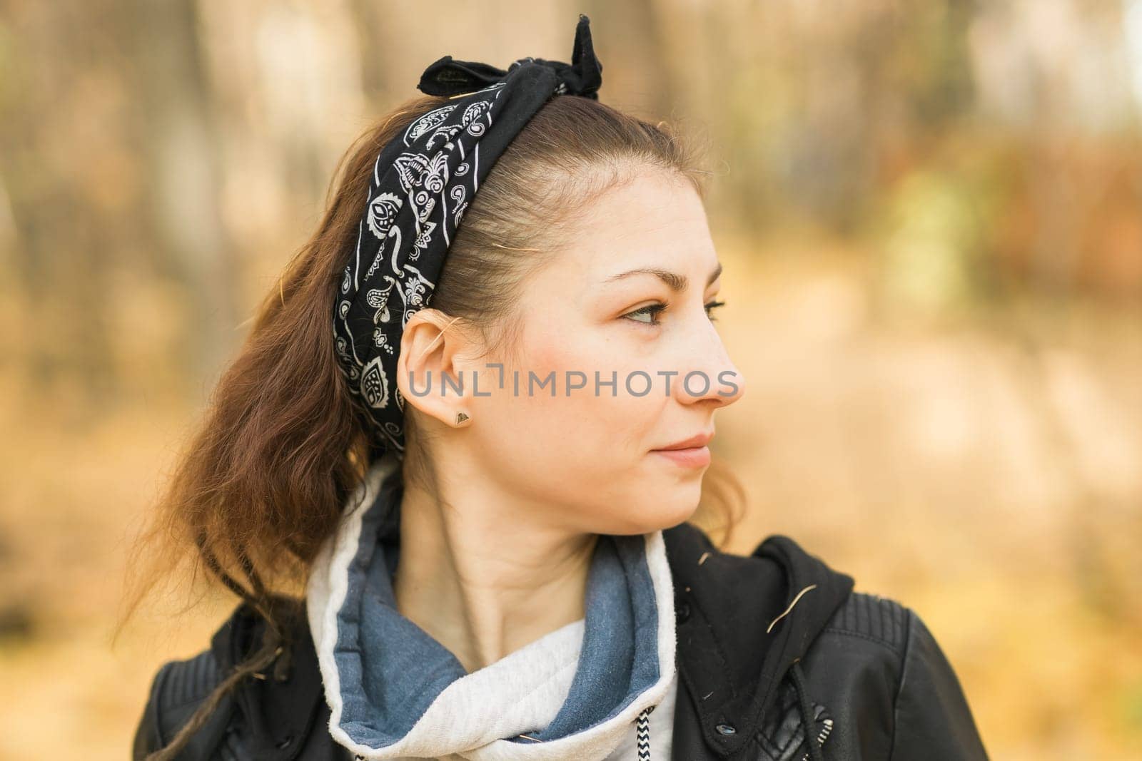 Autumn portrait of a beautiful happy woman in fall season copy space mockup. Millennial generation female. Natural beauty concept by Satura86
