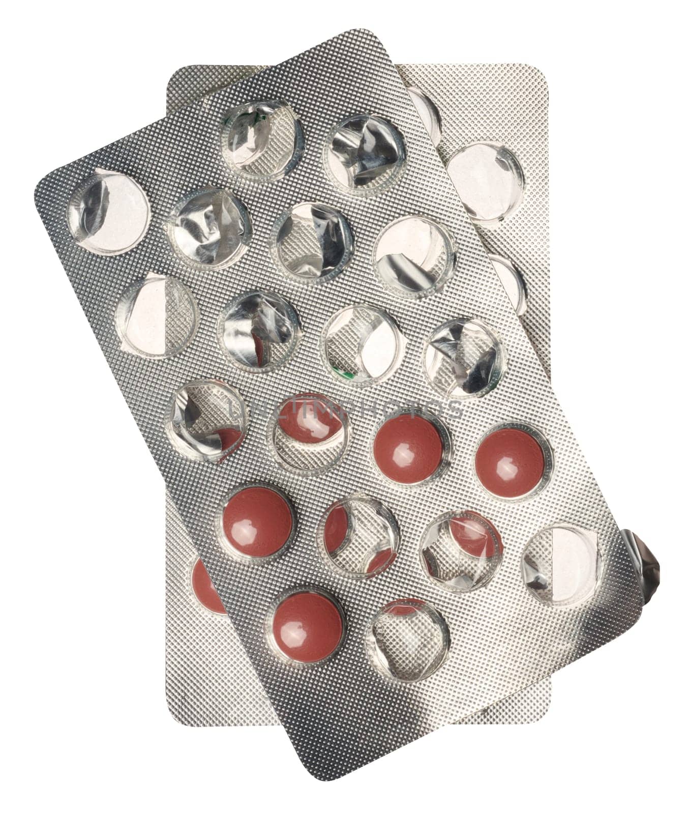 Round brown tablets in blister pack, top view