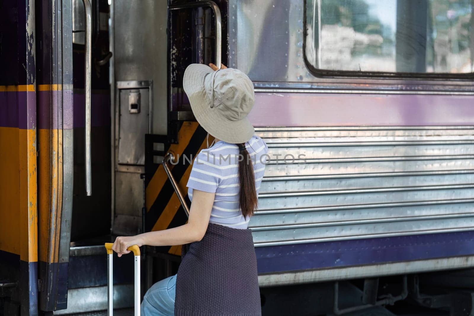 backpack woman and man say hi each other at train station, to travel during holiday.