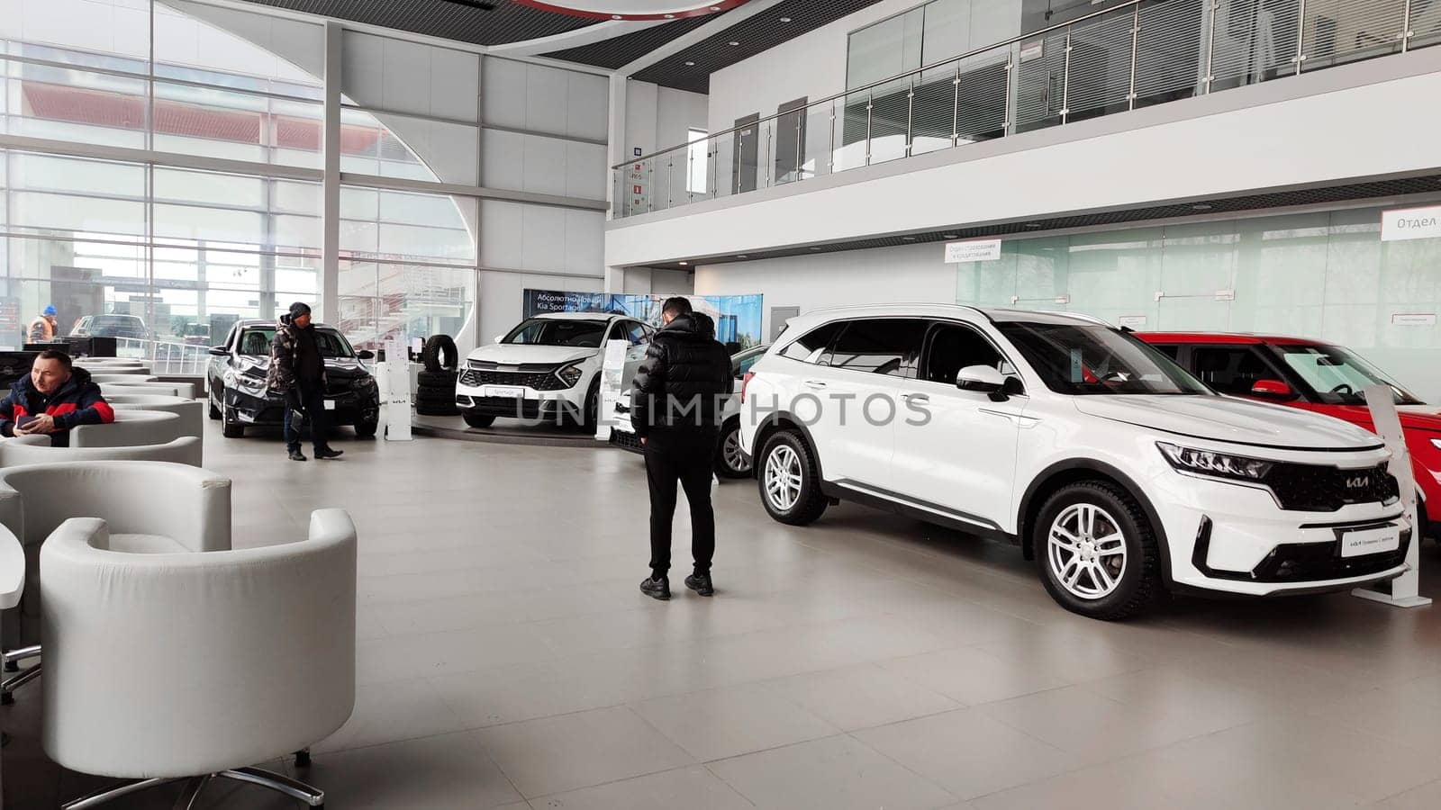 Cheboksary, Russia - March 20, 2023: Cars in showroom of dealership KIA