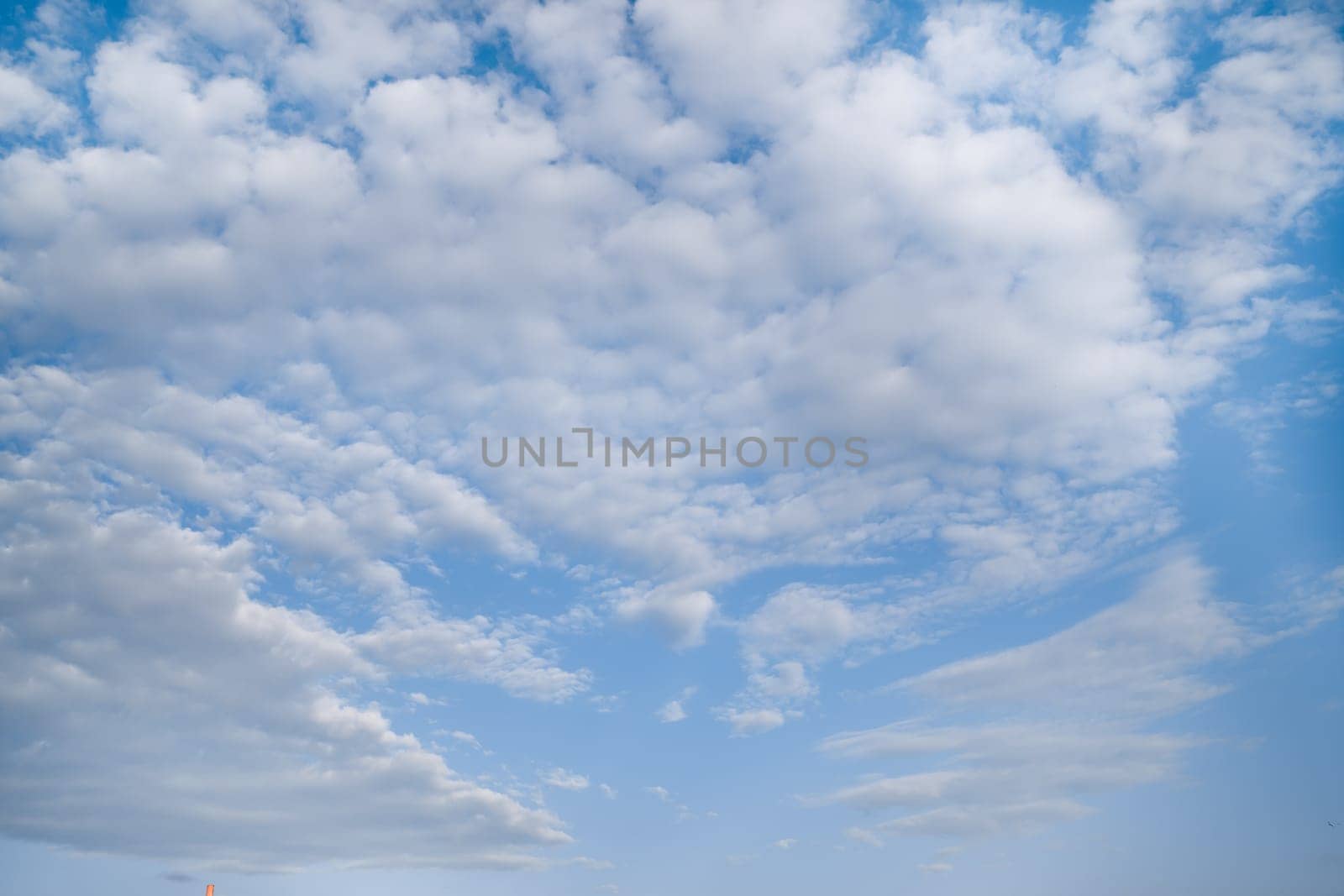 White clouds on background blue sky.