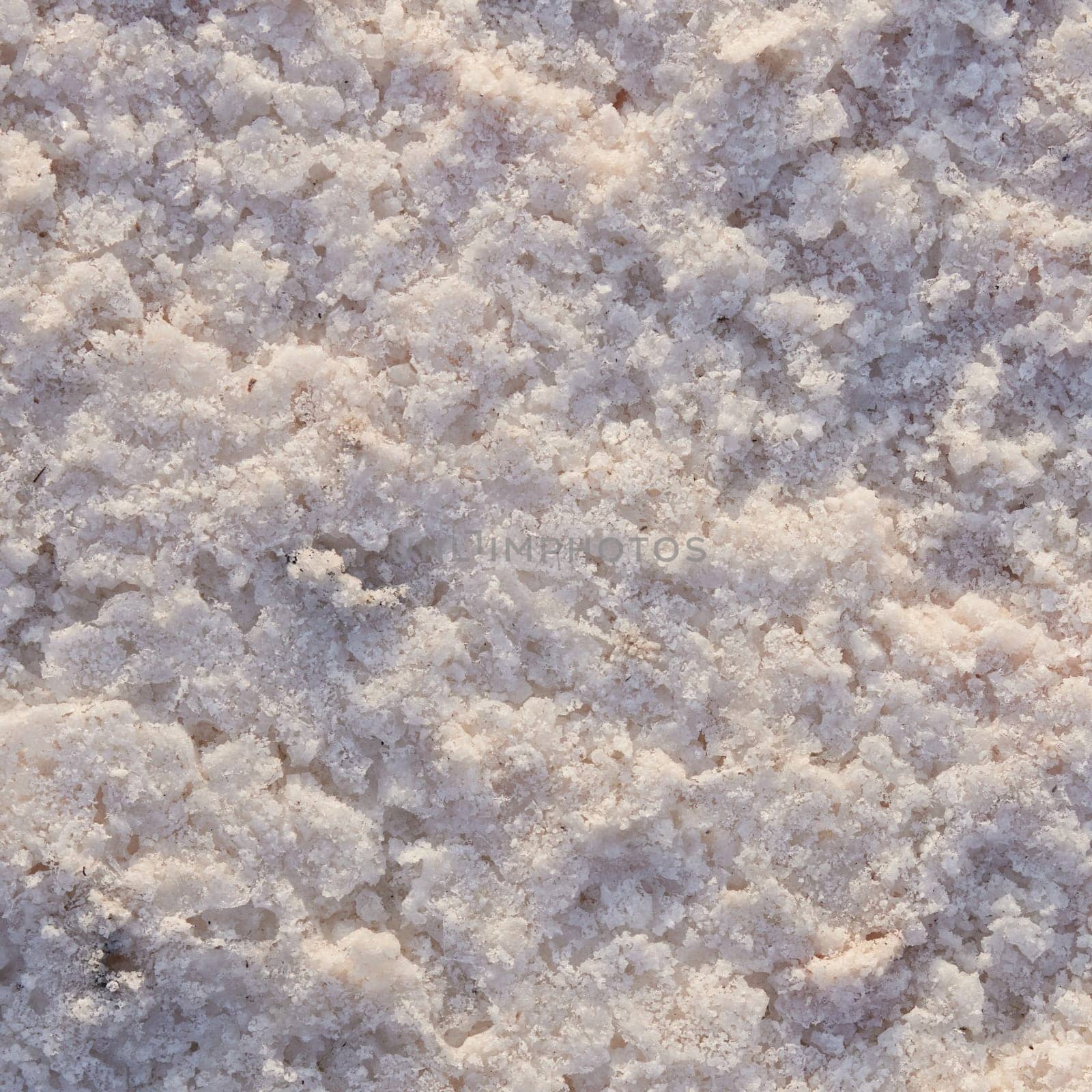 Natural salt Close up. Surface of a salt lake. Natural background. Natural formations of Salt crystals. Top view on Pink salt lake by EvgeniyQW