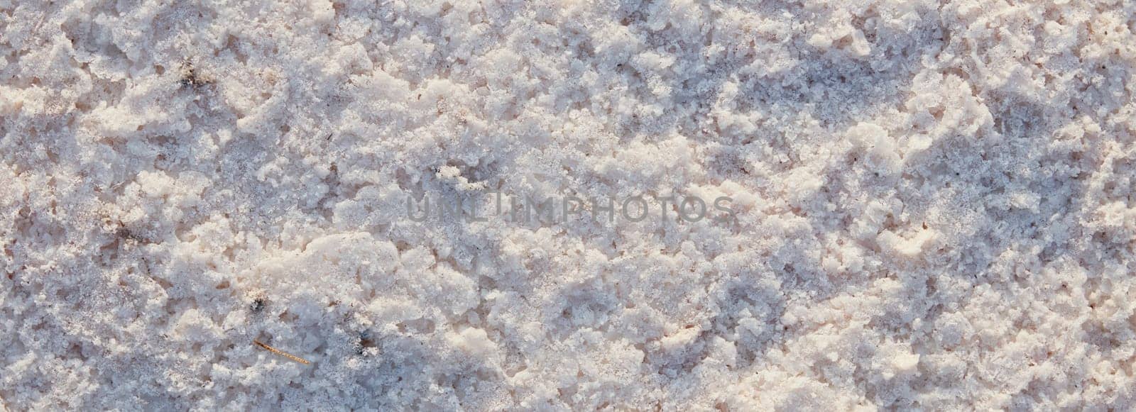 Natural salt Close up. Surface of a salt lake. Natural background. Natural formations of Salt crystals. Top view on Pink salt lake by EvgeniyQW