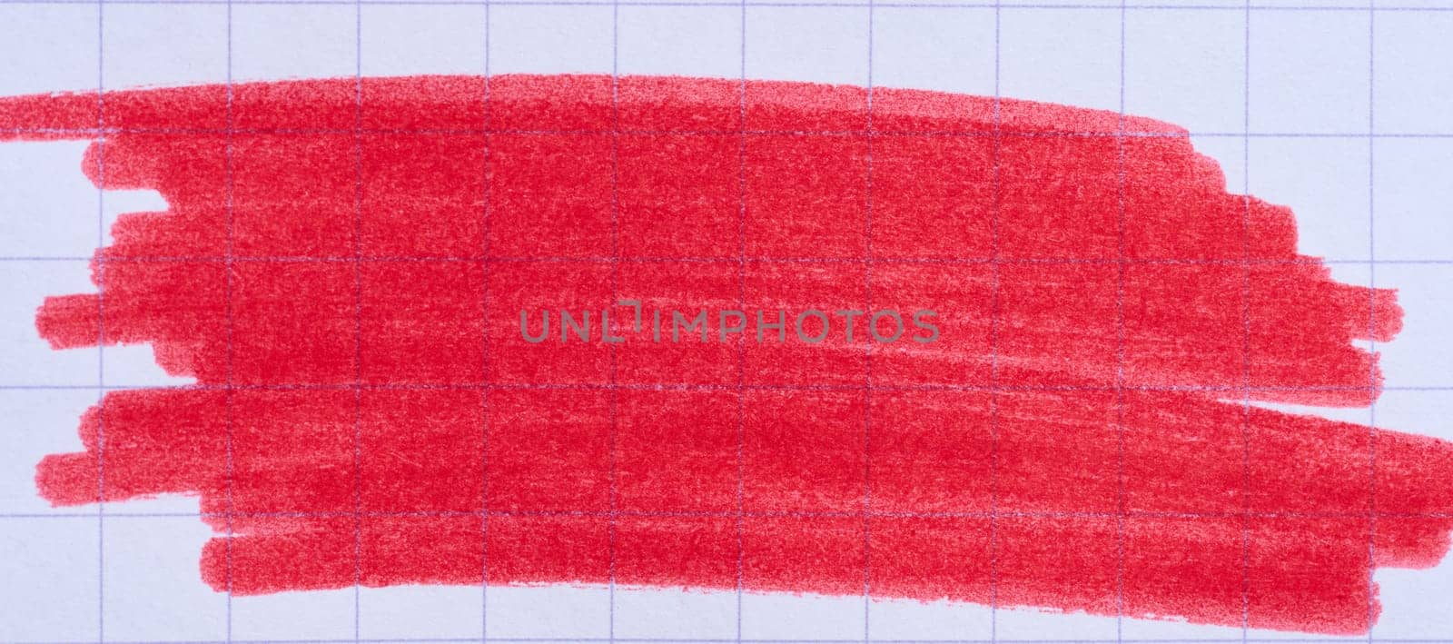 Hatching with a red felt-tip pen on a sheet of checkered paper