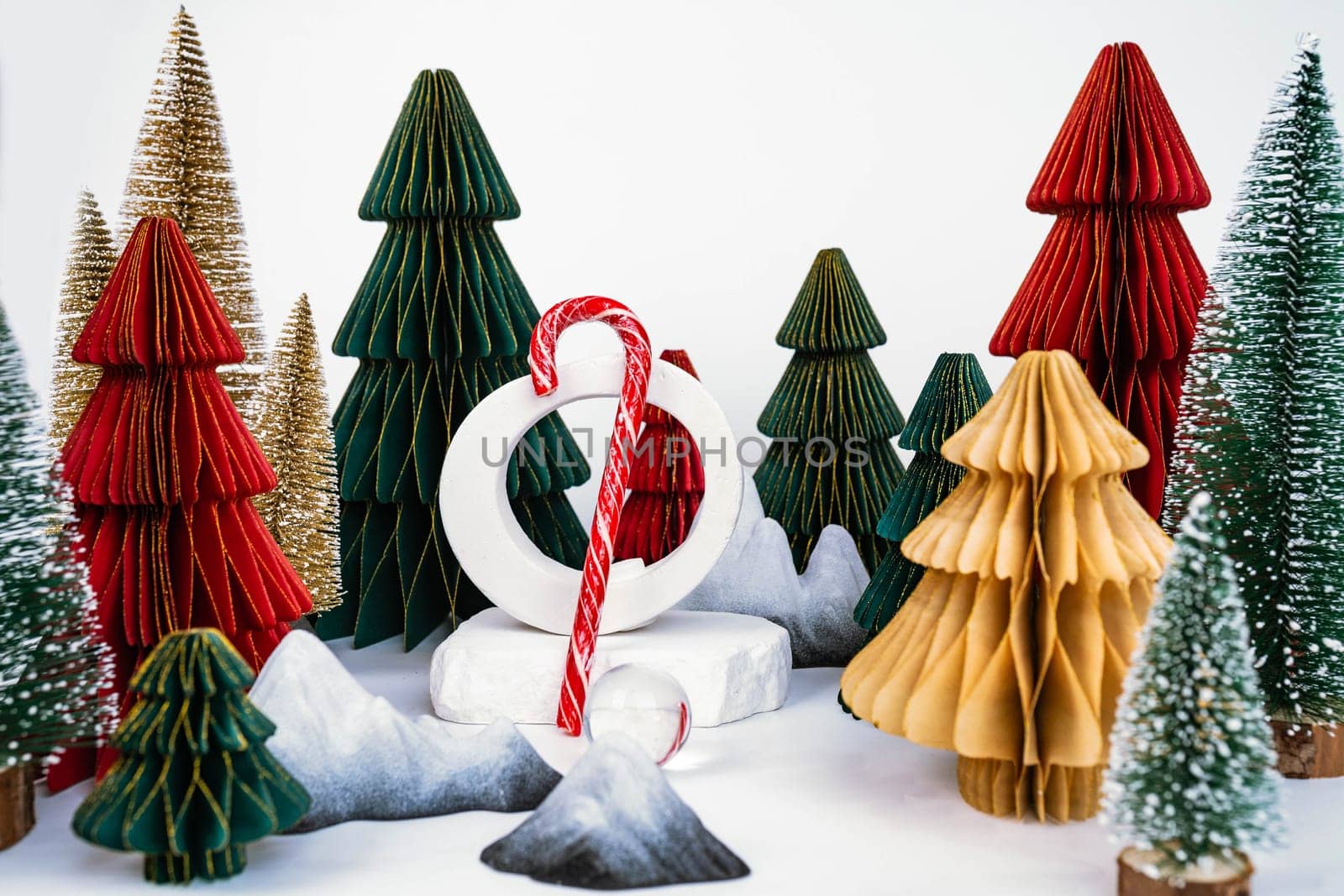 Christmas background with decorative Christmas trees. Candy stick. Advertising concept by tewolf