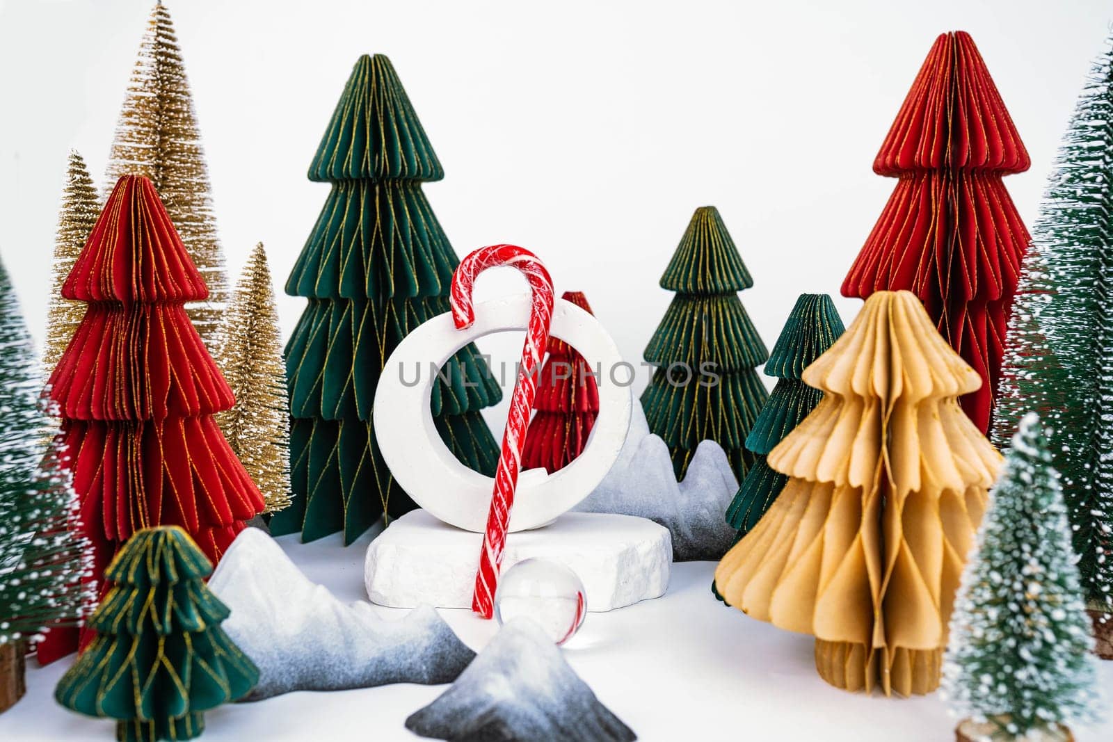 Christmas background with decorative Christmas trees. Candy stick. Advertising concept by tewolf