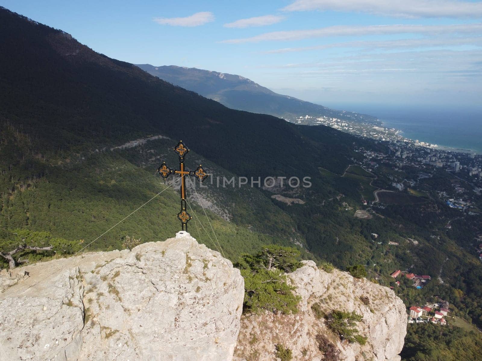 Aerial panoramic view of forest on rocky mountain slope - Ai Petri, Yalta, Crimea. Abstract aerial nature forest and mountains. Weather and Climate Change. Vacation, travel and holiday concept by panophotograph