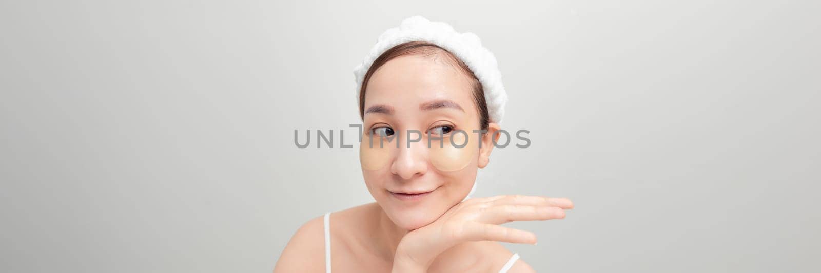 Banner of romantic woman face with under eye patches from dark-circles and tired skin look. by makidotvn