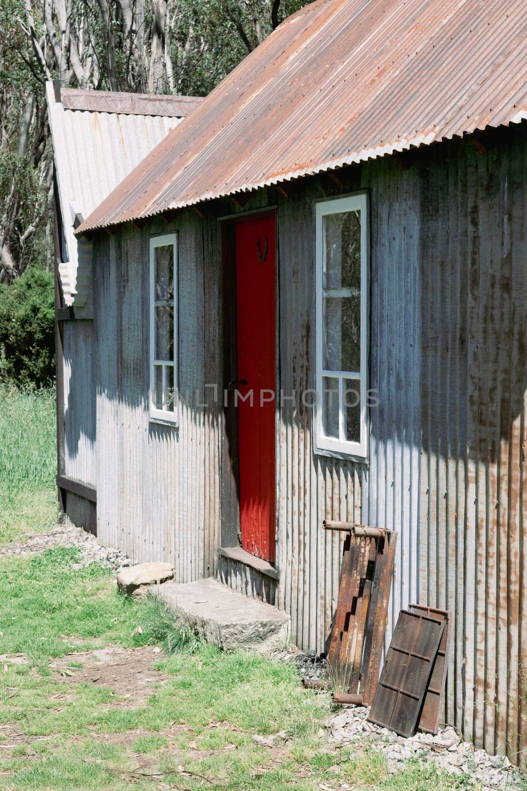 The historic Horse Camp Hut in Kosciuszko National Park near Schlink Pass on a clear summer's day, in the Snowy Mountains, New South Wales, Australia