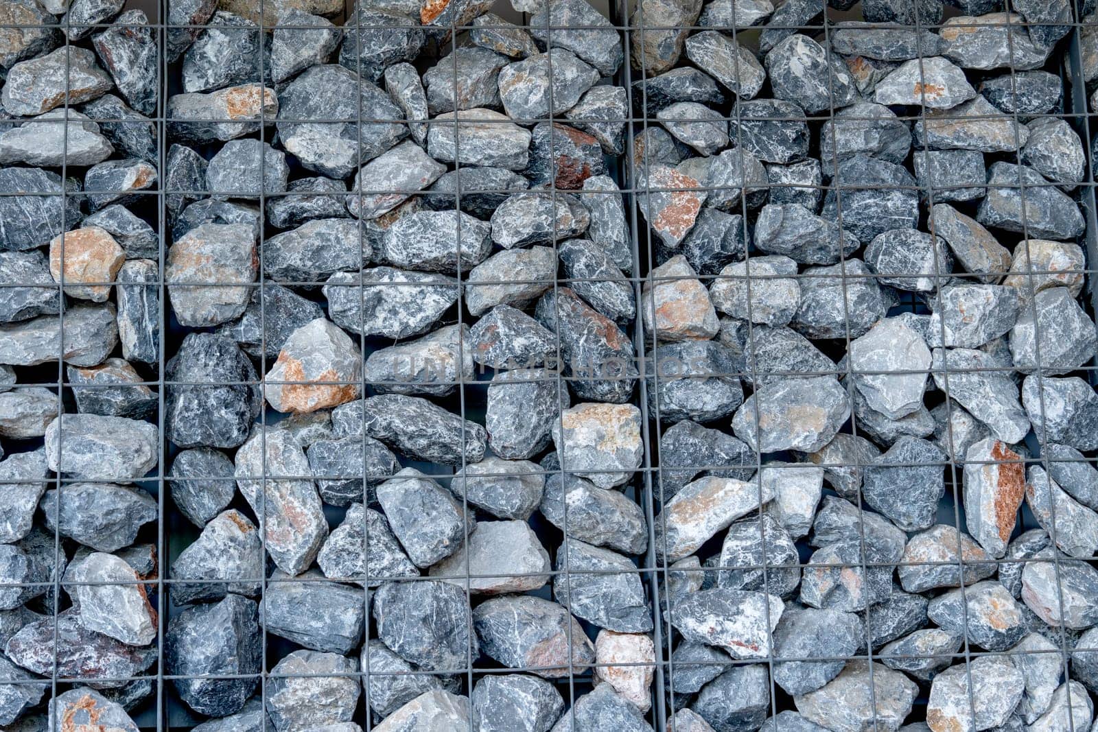 The layer of rock or stone are set up as the wall in some building or factory. by nrradmin