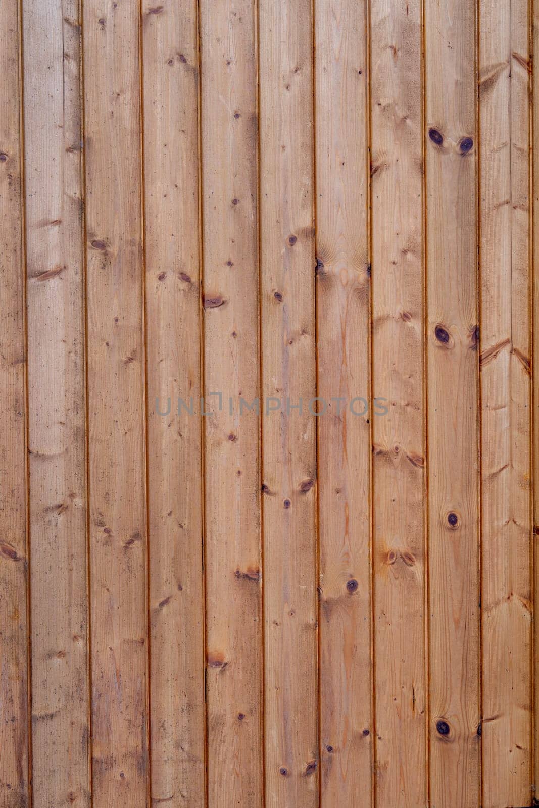 Wood stack or set of wood as wall of the building to make modern and nature style.