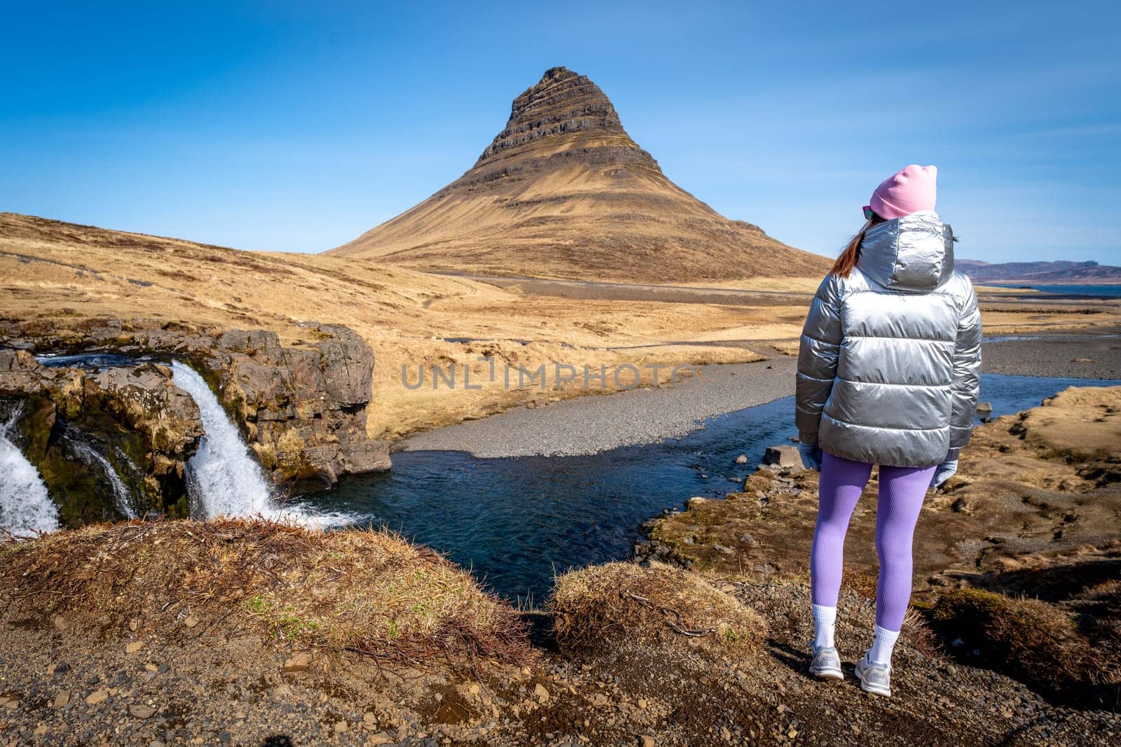 Woman from behind in Kirkjufell, Iceland