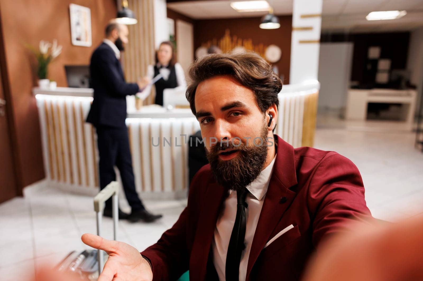 POV of employee calling manager on videoconference online to share international meeting results, hotel lounge area. White collar worker travelling on business trip to forge partnership.