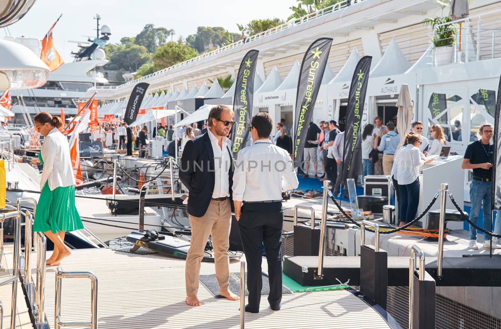 Monaco, Monte Carlo, 29 September 2022 - a lot of people, clients and yacht brokers look at the mega yachts presented, discuss the novelties of the boating industry at the famous motorboat exhibition by vladimirdrozdin