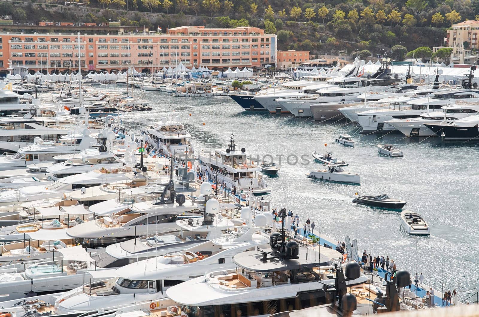 Monaco, Monte Carlo, 29 September 2022 - a lot of luxury yachts at the famous motorboat exhibition, the most expensive boats for the richest people, yacht brokers, boat traffic. High quality photo