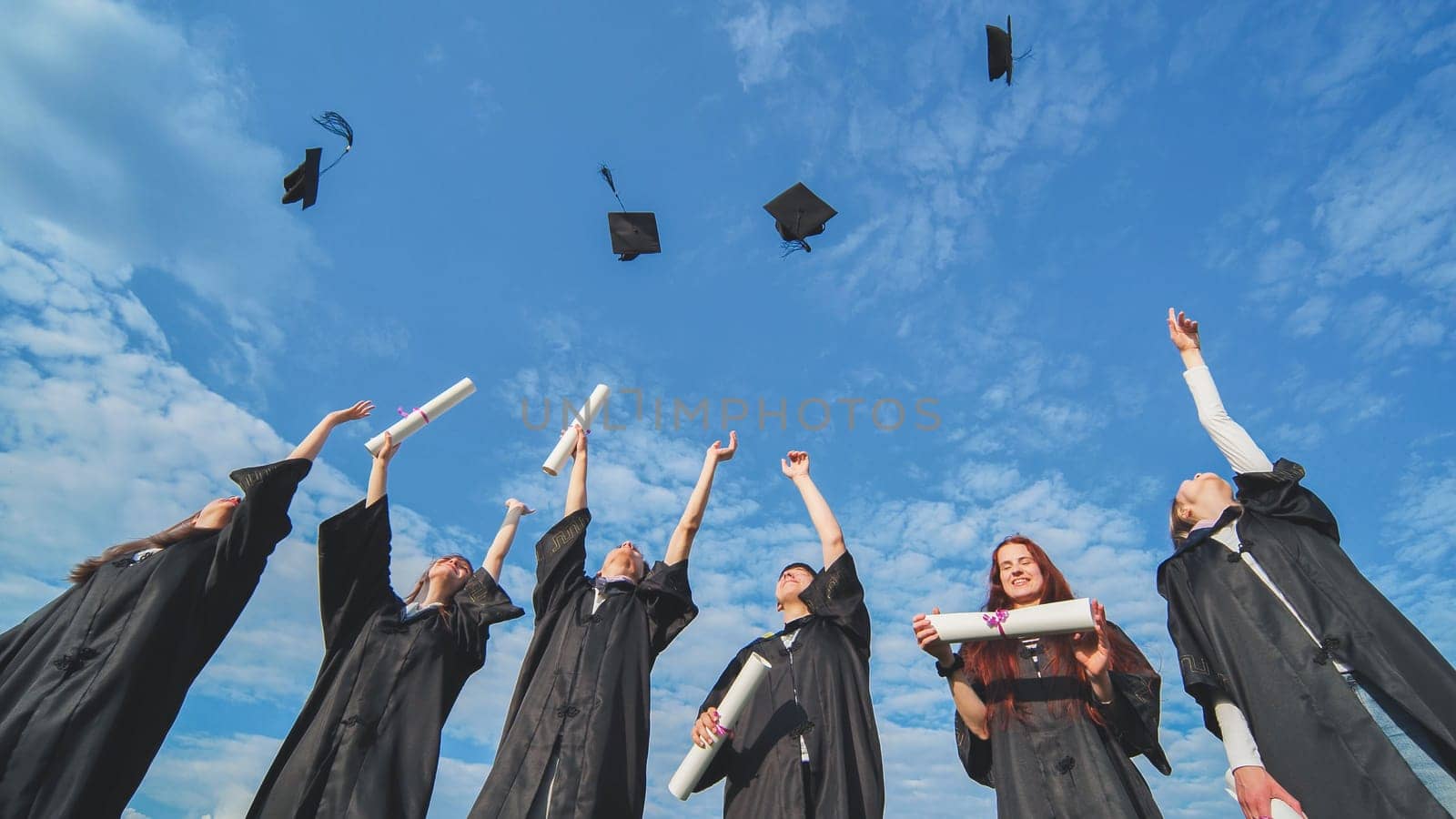 Graduation Caps Thrown in the Air