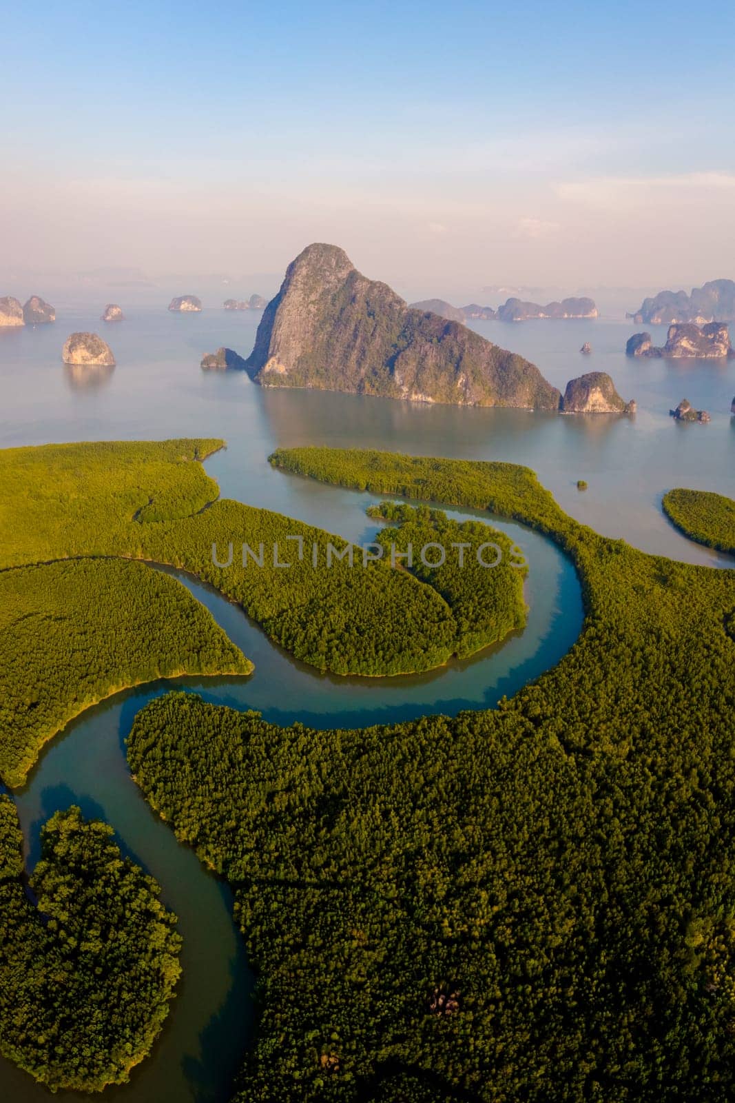 Sametnangshe viewpoint of mountains in Phangnga Bay with mangrove forest in the Andaman Sea with evening twilight sky, travel destination in Phangnga, Thailand