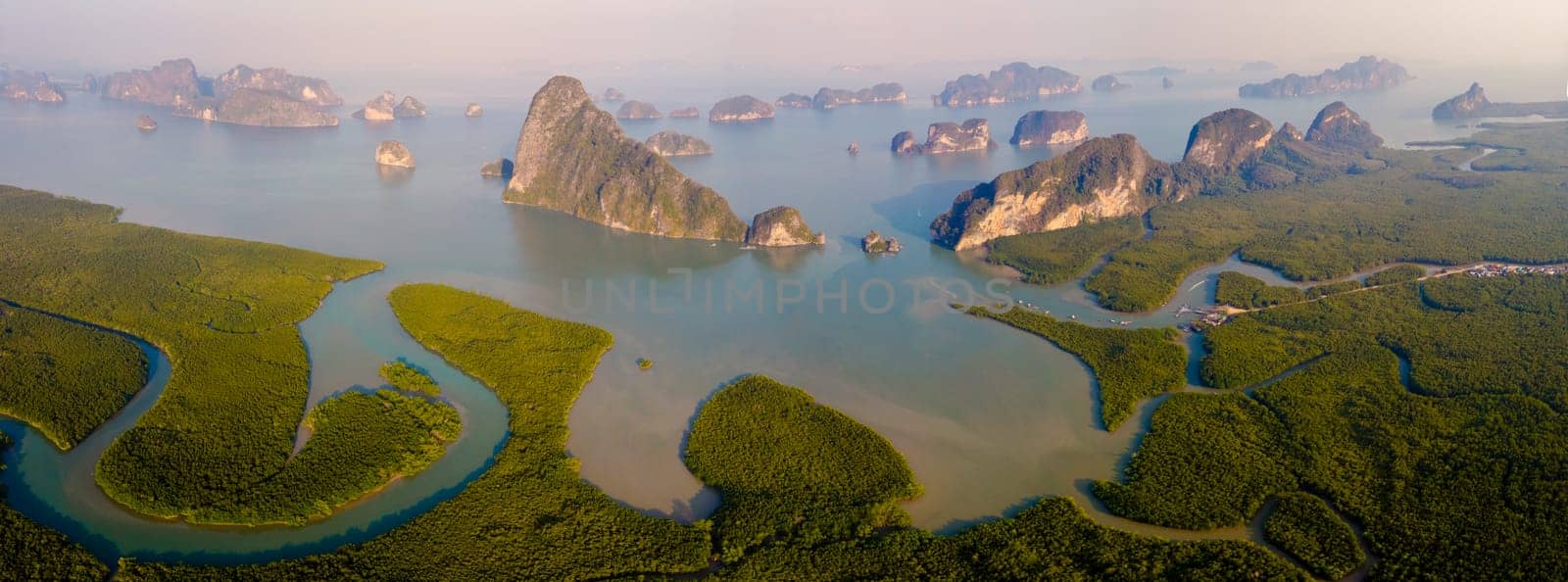 sunrise at Sametnangshe viewpoint of mountains in Phangnga Bay with mangrove forest in the Andaman Sea with evening twilight sky, travel destination in Phangnga, Thailand