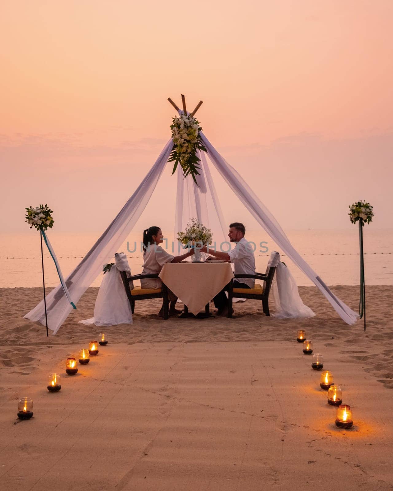 Romantic dinner on the beach in Pattaya Thailand by fokkebok