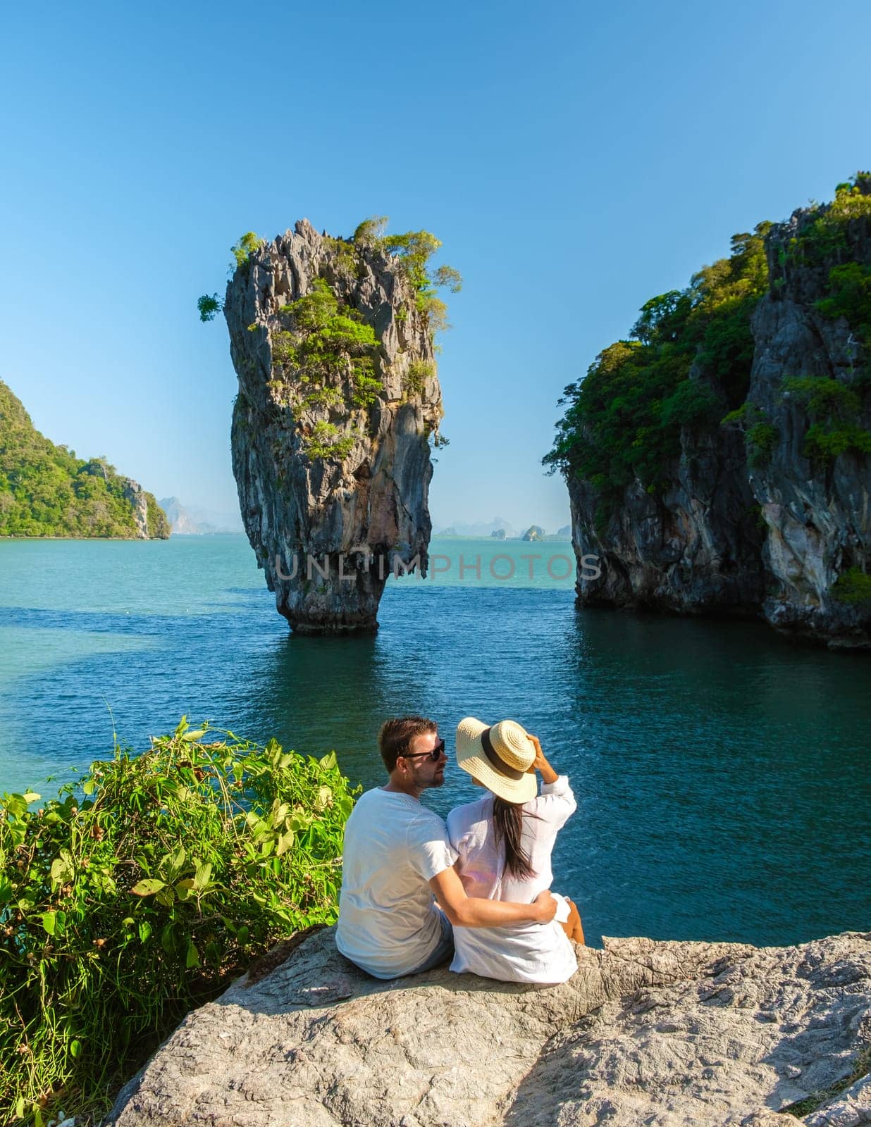 James Bond Island Phangnga Bay Thailand, couple visit the Island near Phuket Thailand by fokkebok