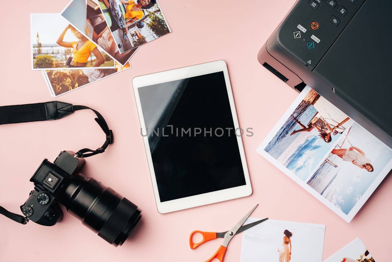 Printer, photo camera and digital tablet on the table. Printing photos concept