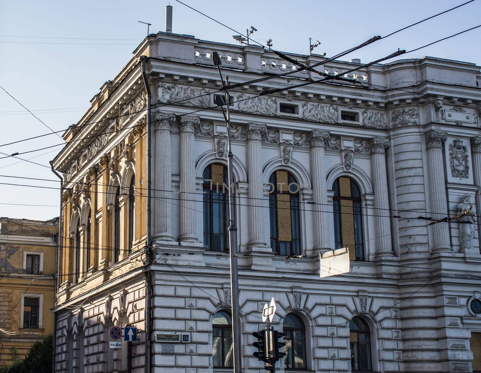 Morning Kharkiv city center buildings and landscapes photo. The historical center with old buildings. Urban city life during the war. High quality picture for wallpaper, travel blog.