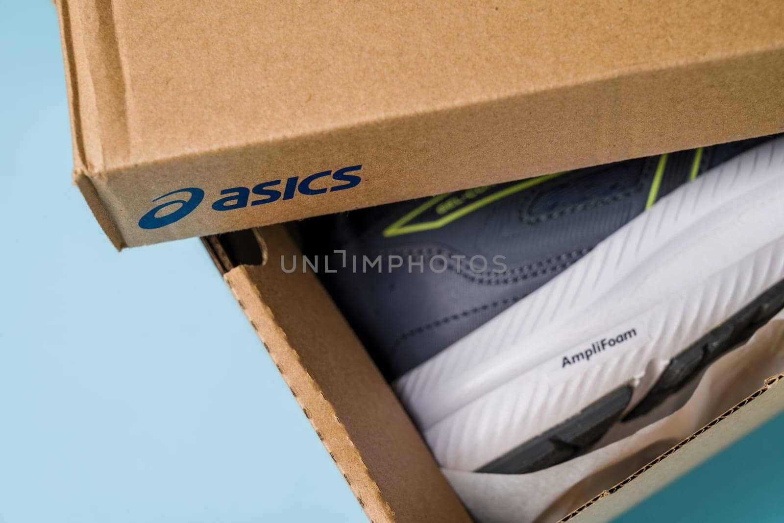 Antalya, Turkey - November 28, 2023: Asics running shoes with new technology soles in shoe box by Sonat