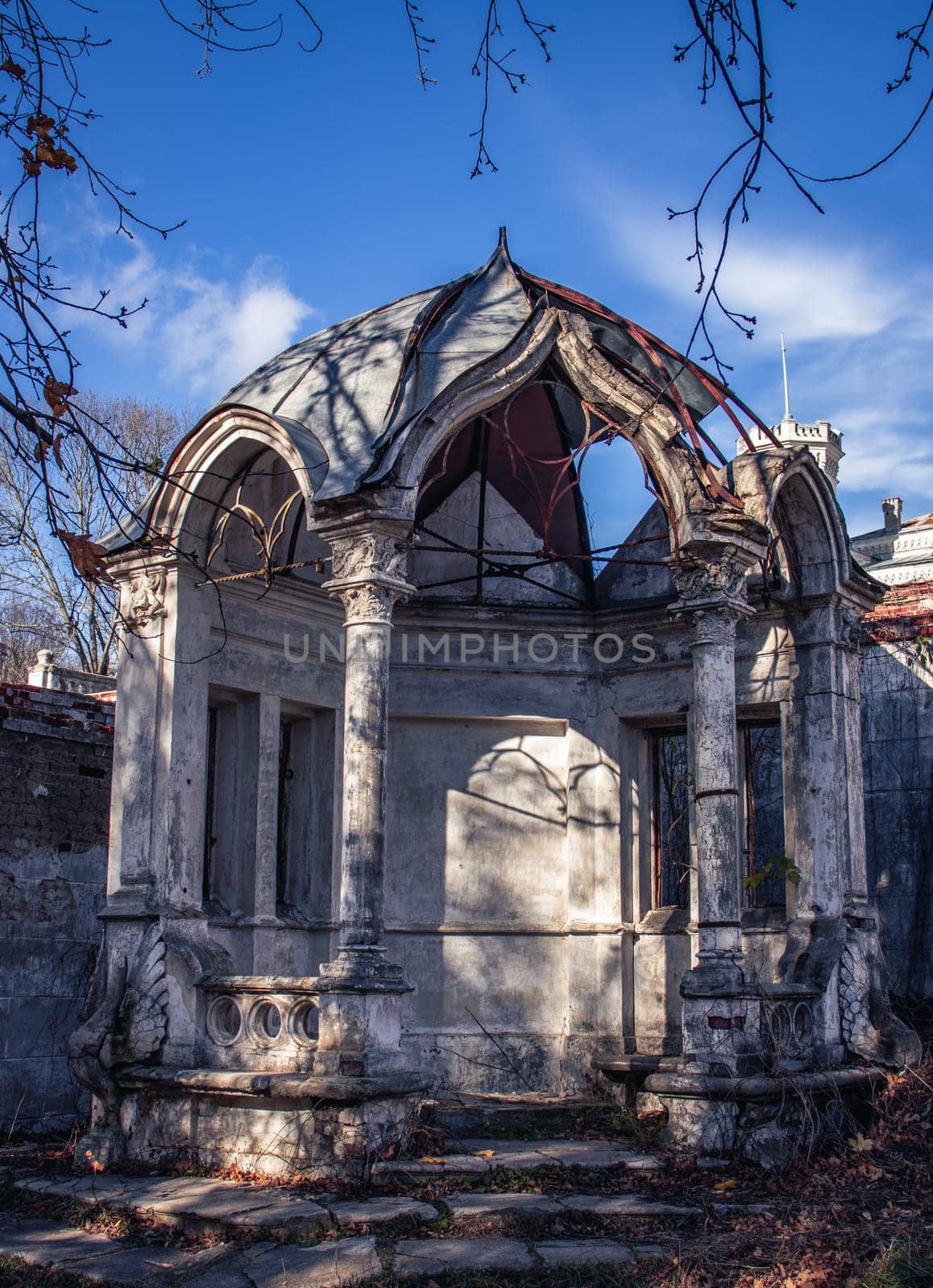 Ruined gazebo in the park concept photo. Autumn morning in Sharovka palace, Kharkiv, Ukraine. by _Nataly_Nati_