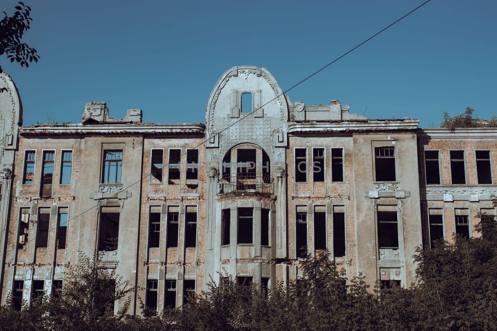 Ruined walls and windows old architecture photo. Old brick destroyed building photography. Street scene. High quality picture for wallpaper, travel blog.