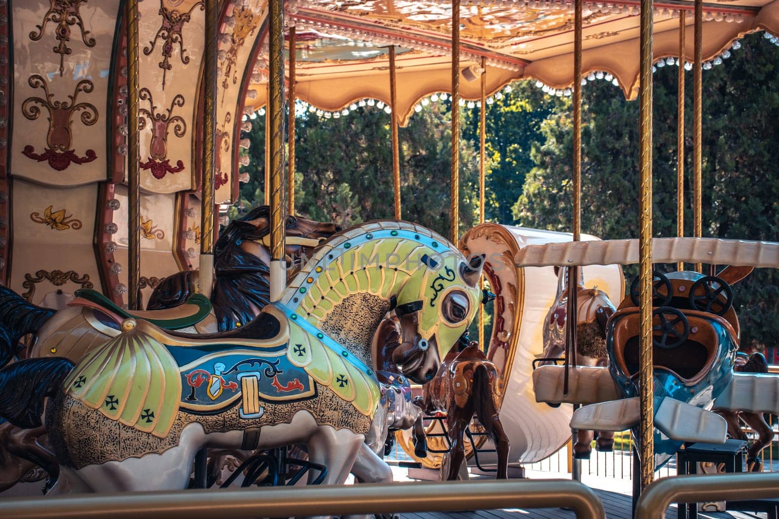 Amusement park horse on a carousel concept photo. Front view photography with blurred background. High quality picture for wallpaper, travel blog, magazine, article