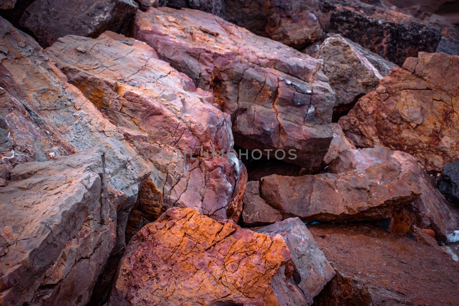 Big seaside rock texture concept photo. Panoramic Mediterranean close up red stones. by _Nataly_Nati_