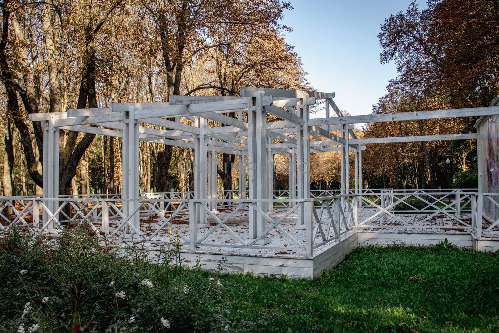 Gazebo in morning autumn public garden park concept photo. Urban city life. Parkland of European town. High quality altanka picture for wallpaper