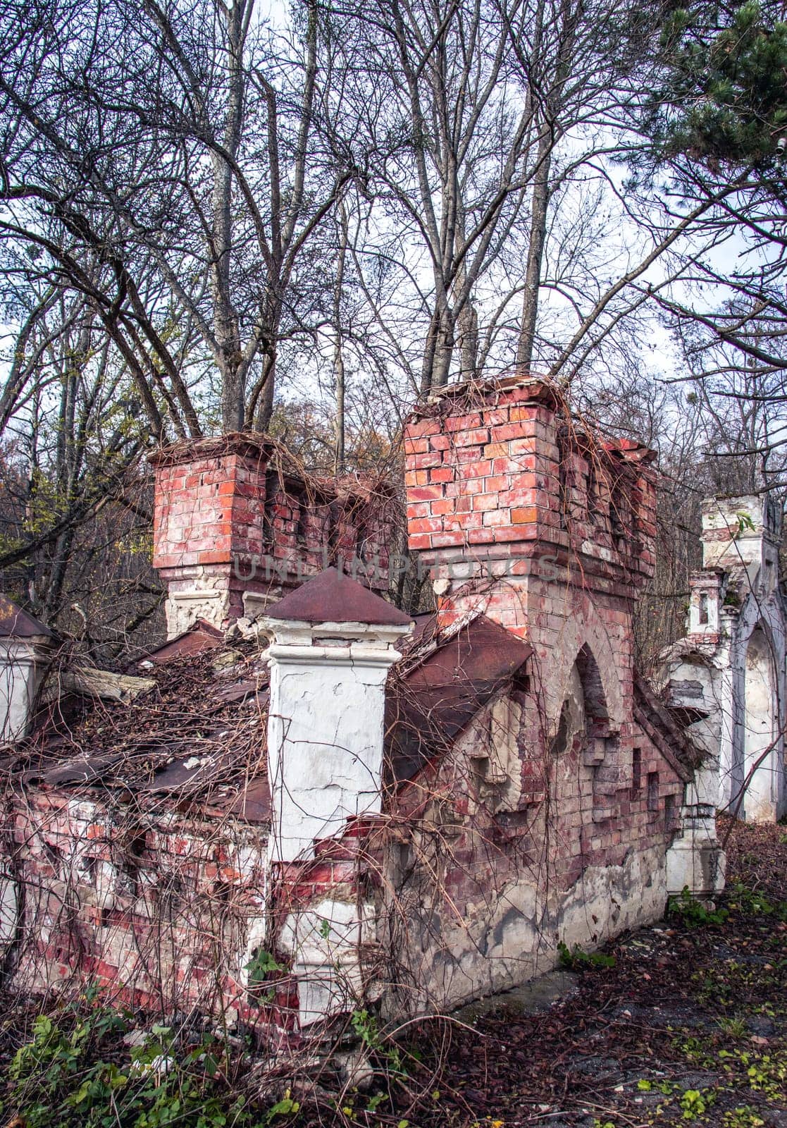 The tower of the old castle concept photo. Tower of medieval palace. Damaged tower view. Architectural detail of ruined building. Ukrainian moldings. High quality picture for wallpaper, travel blog.