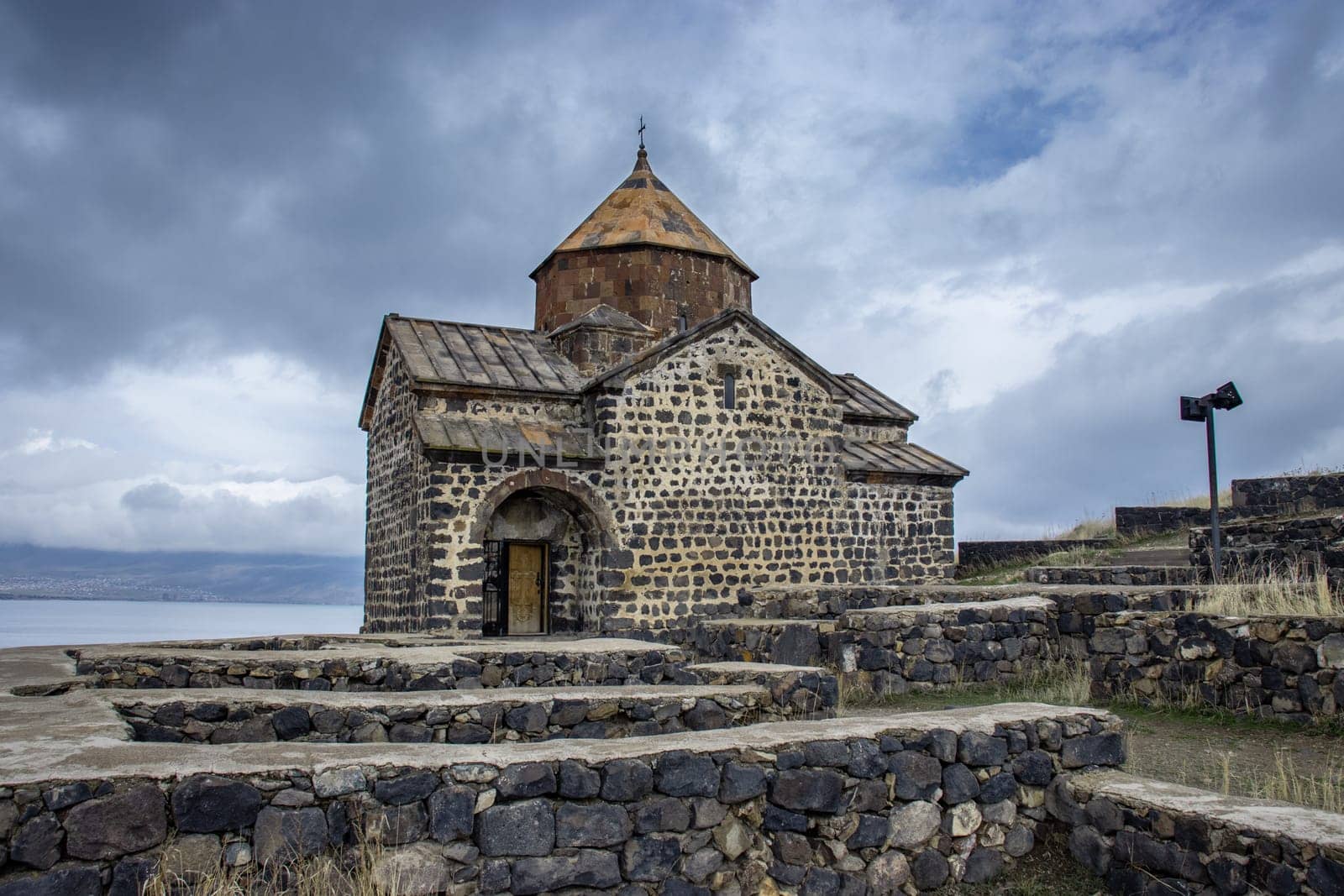 Monastery complex under dramatic spring sky photo. by _Nataly_Nati_