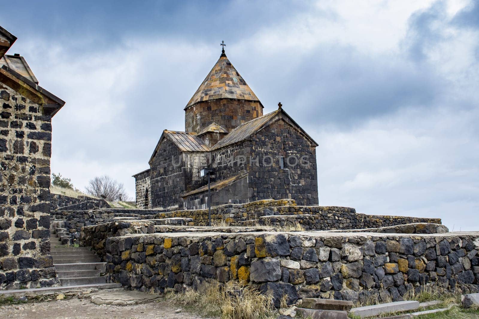 Sevanavank Monastery on the Sevan Peninsula on the shore of Lake Sevan concept photo. Monastery complex on the hill. High quality picture for wallpaper