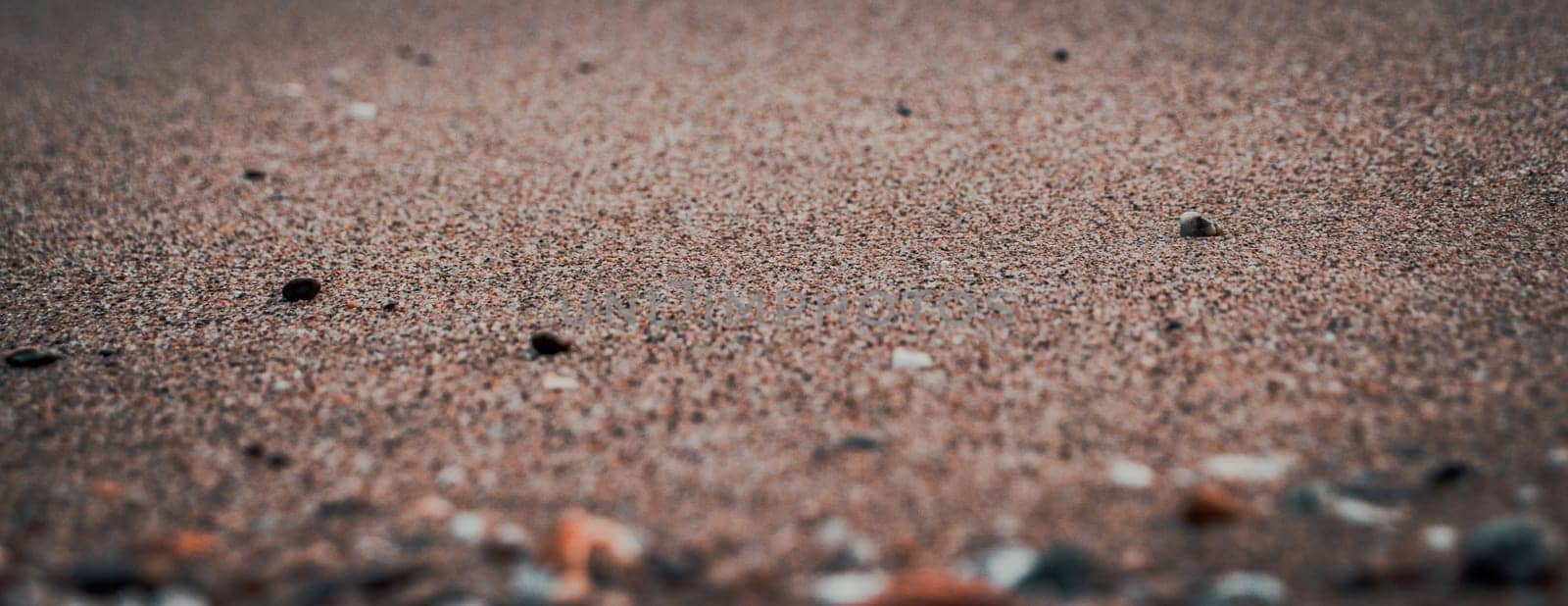 Close up sand beach background concept photo. Colorful small sea stones on the beach. by _Nataly_Nati_