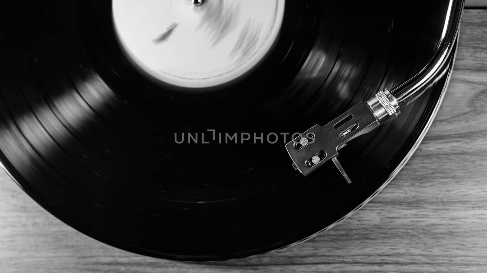 Black and white classic vinyl record,turntable spin, analog sound, music.Vintage by kristina_kokhanova