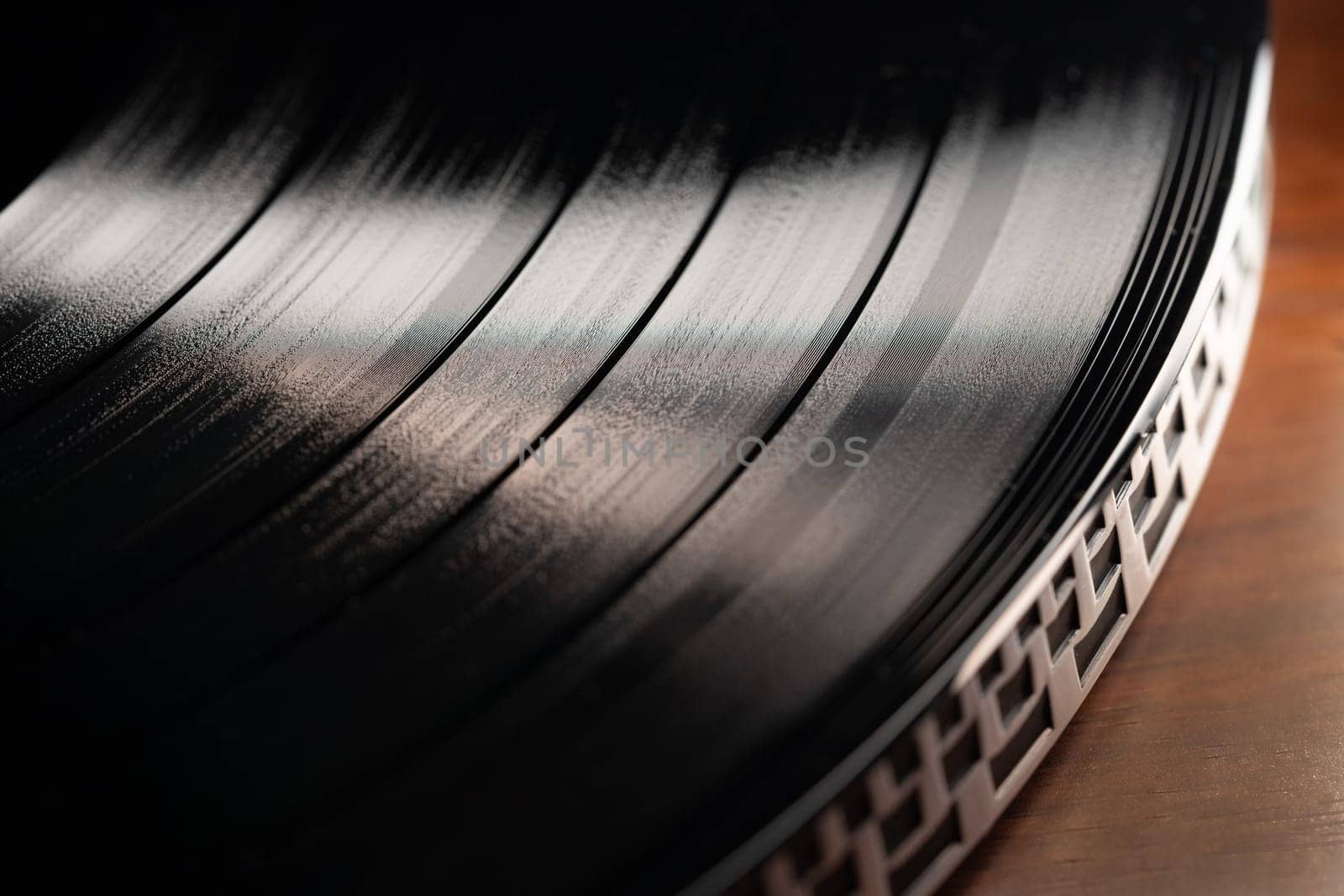 Classic vinyl record, turntable spin, analog sound, music concept. Celebrating retro vibes, vintage aesthetics. Macro dynamic motion. Iconic imagery. High quality