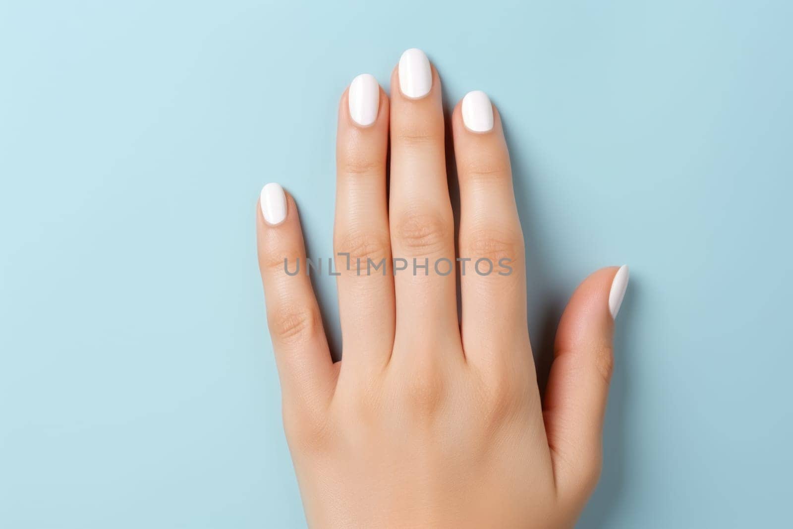 Young woman hands with white nails on light blue background. AI Generated by Desperada