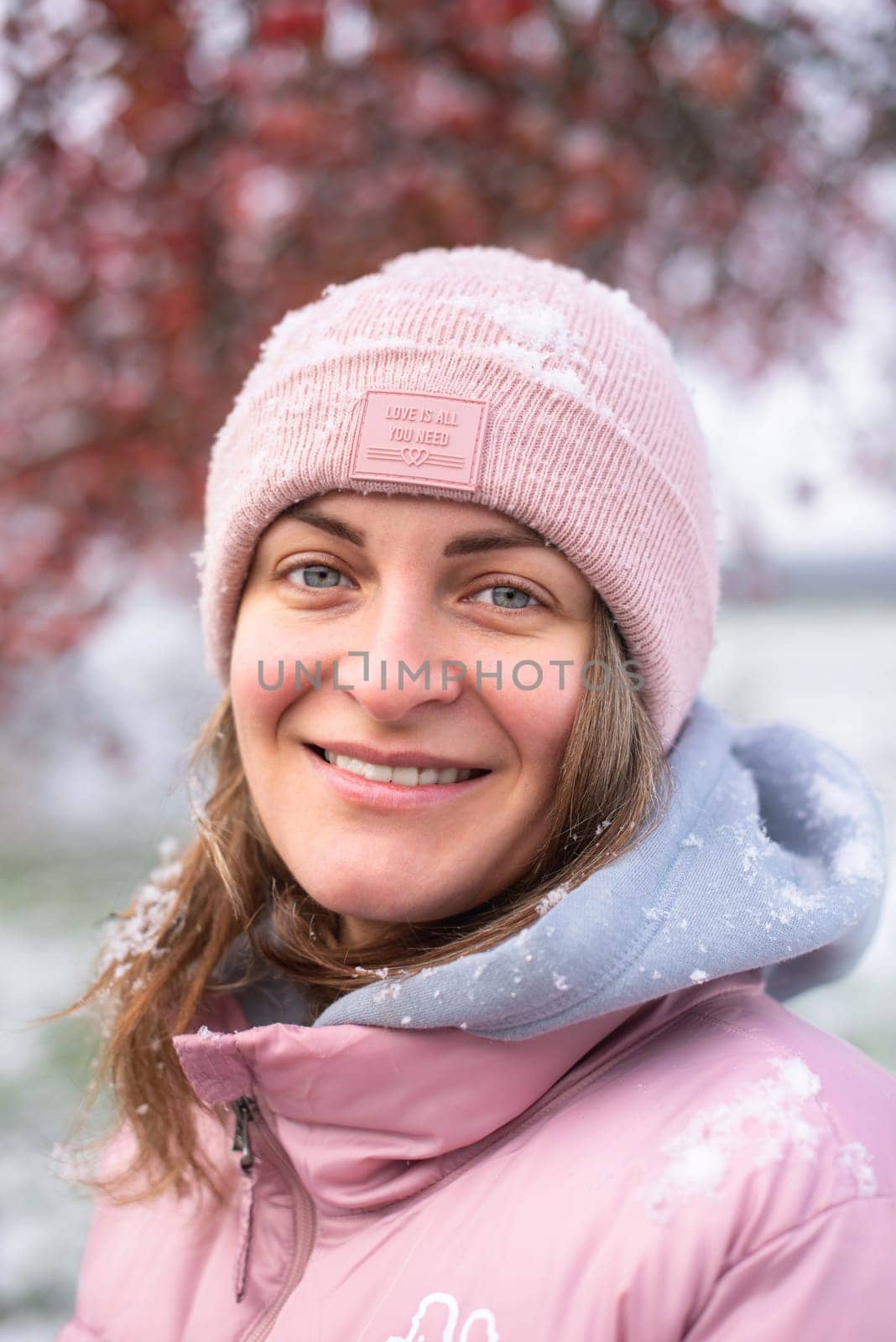 Winter Elegance: Portrait of a Beautiful Girl in a Snowy European Village