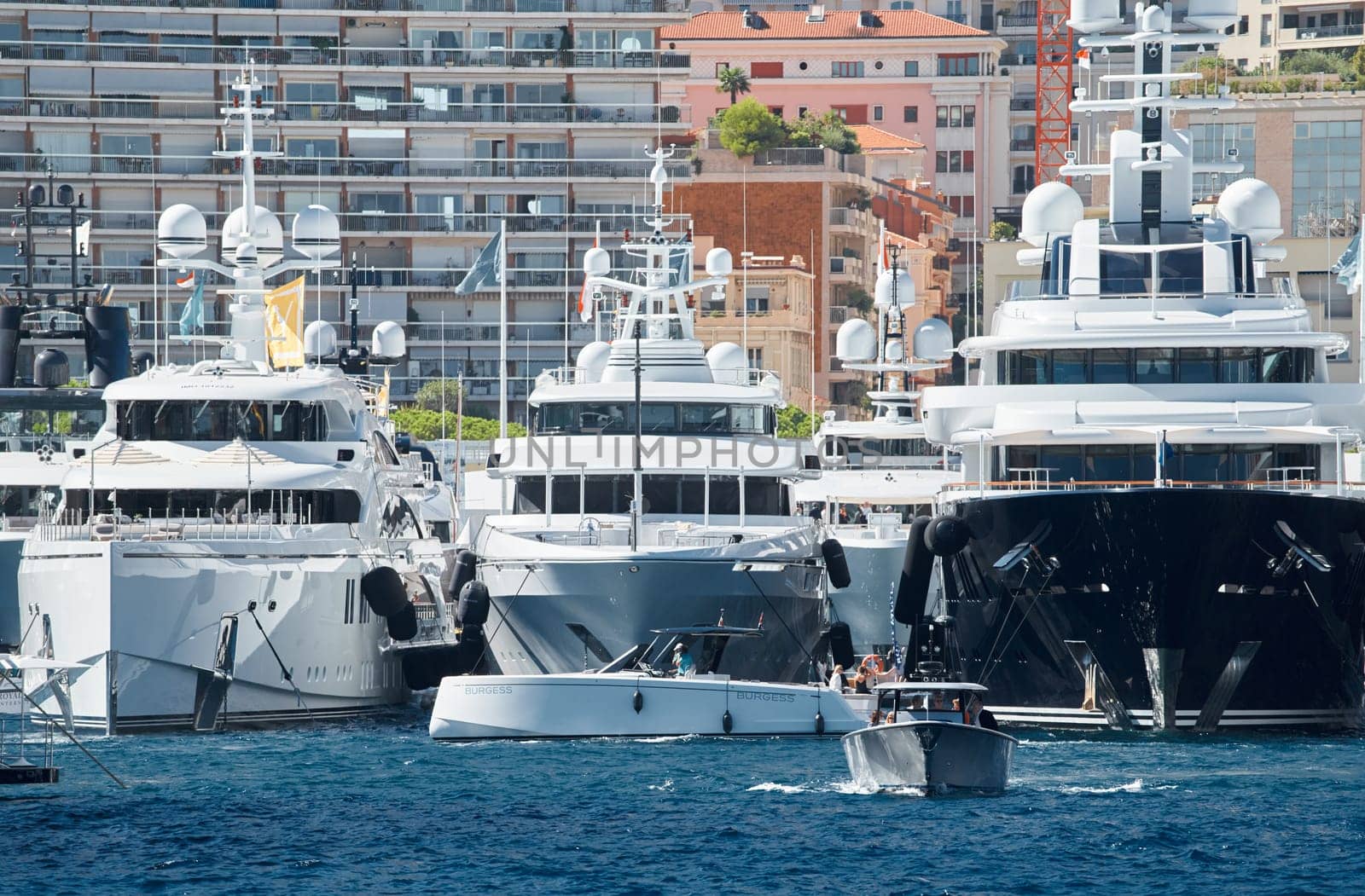 Monaco, Monte Carlo, 28 September 2022 - a lot of luxury yachts at the famous motorboat exhibition in the principality, the most expensive boats for the richest people around the world, yacht brokers. High quality photo