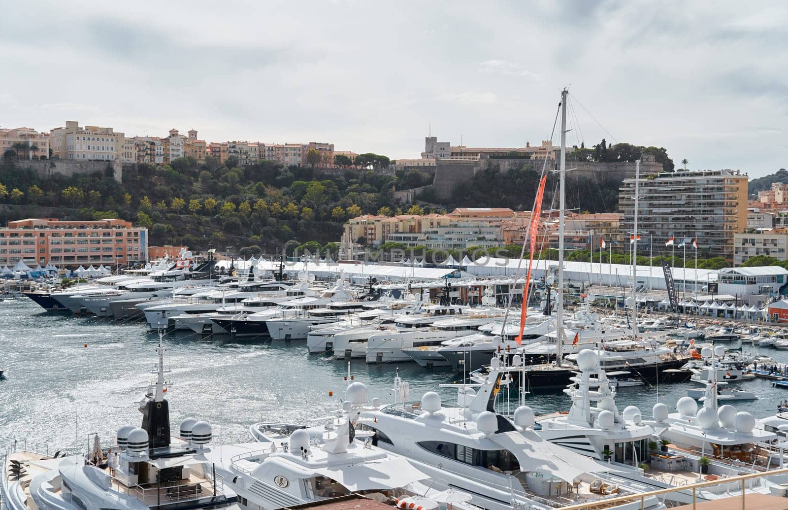 Monaco, Monte Carlo, 29 September 2022 - a lot of luxury yachts at the famous motorboat exhibition, the most expensive boats for the richest people, yacht brokers, boat traffic. High quality photo